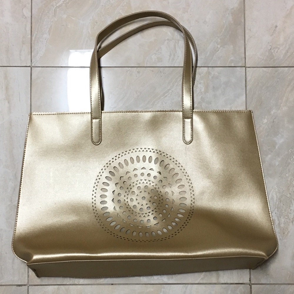Neiman Marcus gold oversized handbag